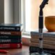 Microphone and books on public speaking for improving communication skills