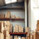 E-commerce warehouse with organised inventory and packaging materials representing customer retention