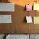 Strategy pinboard with diagrams and compass showing how to create a successful business strategy for a small business