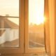 Sunlit bedroom window at dawn illustrating effective ways to build self discipline in the morning
