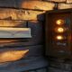 Brass mailbox beside modern intercom illustrating email vs SMS customer retention channels