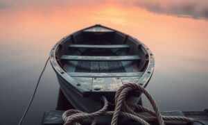 Misty lake dock at sunrise representing entrepreneurs overcoming self-doubt and uncertainty