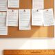 Editor's pinboard with marked-up drafts illustrating how to outsource blog writing for a personal development site